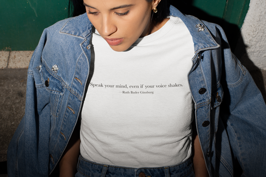 white tee shirt with a quote from Ruth Bader Ginsburg  